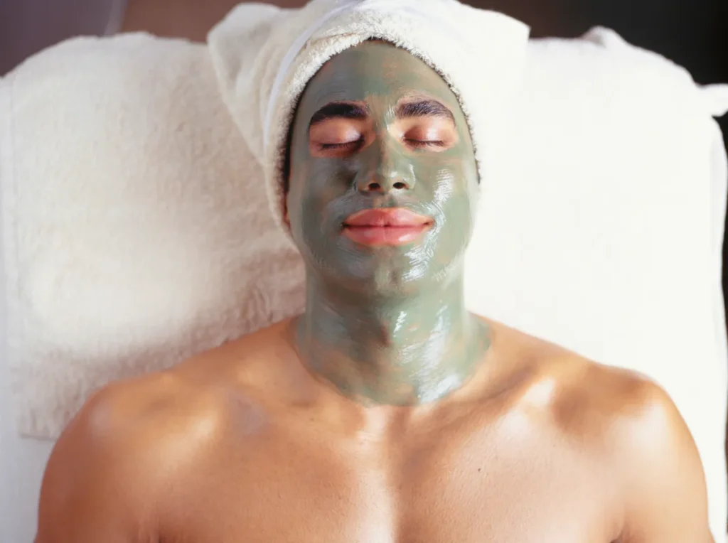 “Man relaxing with a rejuvenating facial mask treatment at Men’s Grooming Spa in Anantapur.”