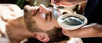 “Man receiving a rejuvenating facial mask treatment at Lotus Men’s Spa in Anantapur — professional men’s skincare and relaxation therapy for a healthy, glowing look.”